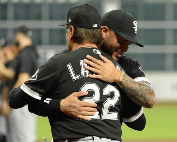 Yoan Moncada hugs Manager Tony La Russa of the Chicago White Sox during introductions prior to Game One of the American League Division Series...
