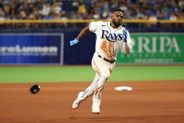 Randy Arozarena of the Tampa Bay Rays runs to third on a double by Wander Franco in the seventh inning against the Boston Red Sox during Game 1 of...