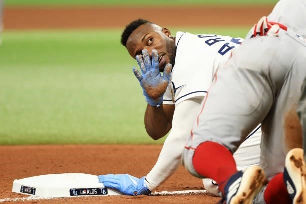 Randy Arozarena of the Tampa Bay Rays reacts on third base in the seventh inning against the Boston Red Sox during Game 1 of the American League...