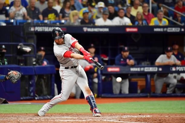 Christian Arroyo of the Boston Red Sox hits a single in the eighth inning against the Tampa Bay Rays during Game 1 of the American League Division...