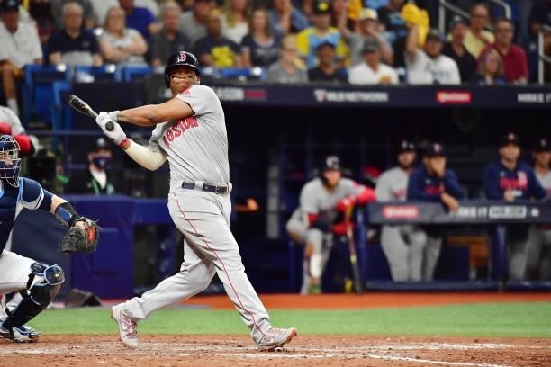 Rafael Devers of the Boston Red Sox strikes out in the eighth inning against the Tampa Bay Rays during Game 1 of the American League Division Series...