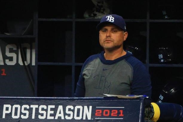 Kevin Cash of the Tampa Bay Rays looks on from the dugout during Game 1 of the American League Division Series against the Boston Red Sox at...