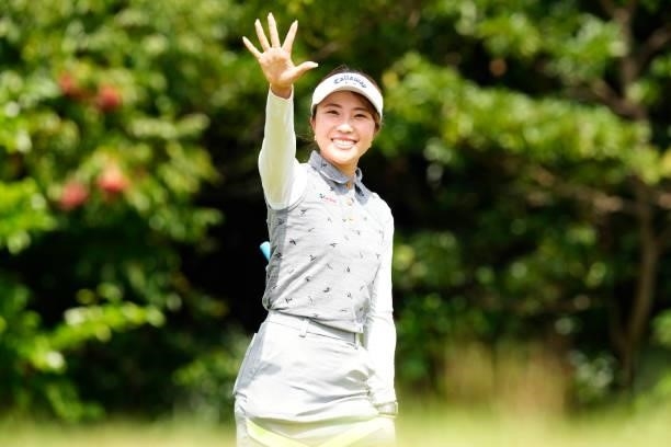 Riko Inoue of Japan waves on the 4th hole during the second round of Kanehide Miyarabi Open at the Kanehide Kise Country Club on October 8, 2021 in...