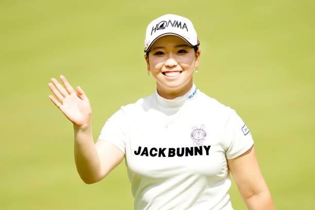 Miyu Goto of Japan waves on the 4th green during the second round of Kanehide Miyarabi Open at the Kanehide Kise Country Club on October 8, 2021 in...