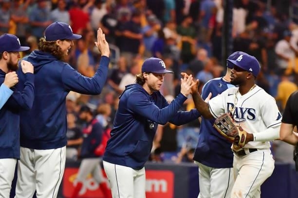 Randy Arozarena of the Tampa Bay Rays celebrates with teammates after their 5-0 win over the Boston Red Sox during Game 1 of the American League...