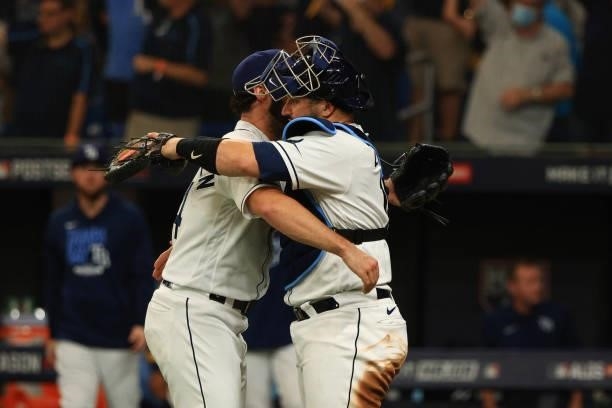 Feyereisen and Mike Zunino of the Tampa Bay Rays celebrate their 5-0 win over the Boston Red Sox during Game 1 of the American League Division Series...