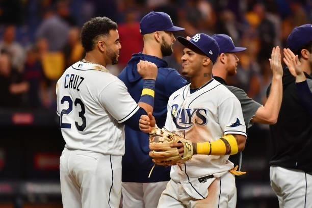 Nelson Cruz and Wander Franco of the Tampa Bay Rays celebrate their 5-0 win over the Boston Red Sox during Game 1 of the American League Division...