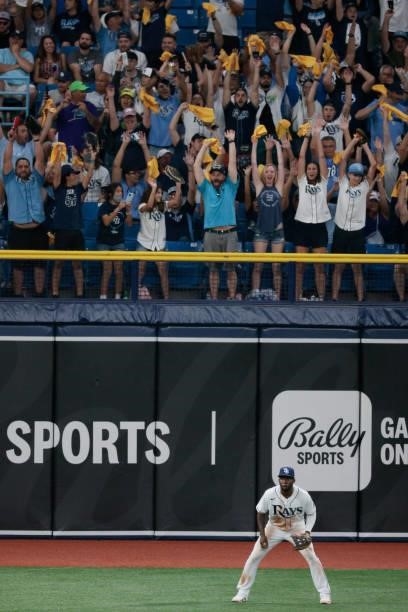 Fans cheer as Randy Arozarena of the Tampa Bay Rays looks on during Game 1 of the American League Division Series against the Boston Red Sox at...