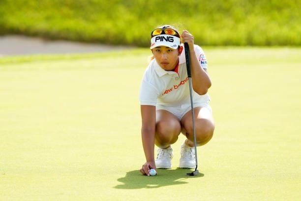 Karin Takeyama of Japan lines up a putt on the 18th green during the second round of Kanehide Miyarabi Open at the Kanehide Kise Country Club on...