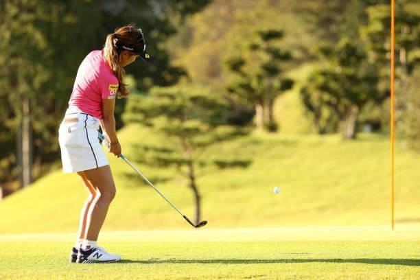 Reika Usui of Japan chips onto the 5th green during the first round of the Stanley Ladies at Tomei Country Club on October 8, 2021 in Susono,...