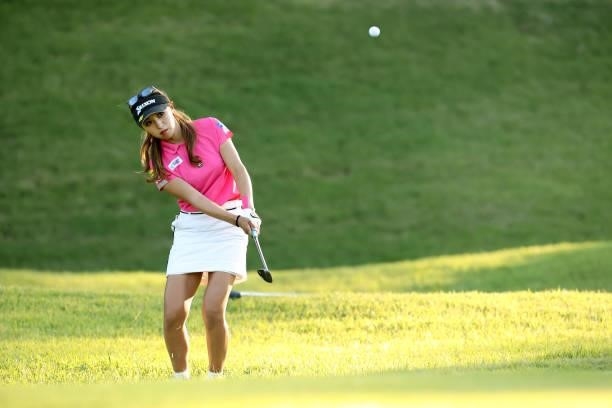 Reika Usui of Japan chips onto the 9th green during the first round of the Stanley Ladies at Tomei Country Club on October 8, 2021 in Susono,...