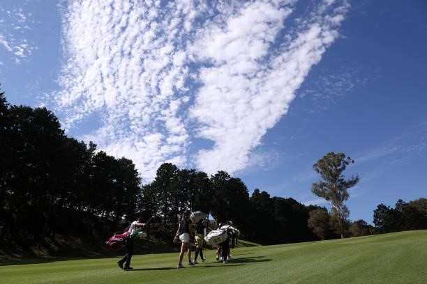 Ayano Yasuda, Nana Suganuma and Hana Wakimoto of Japan walk on the 3rd hole during the first round of the Stanley Ladies at Tomei Country Club on...