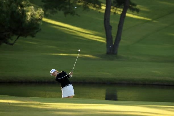 Megumi Takahashi of Japan hits her third shot on the 8th hole during the first round of the Stanley Ladies at Tomei Country Club on October 8, 2021...