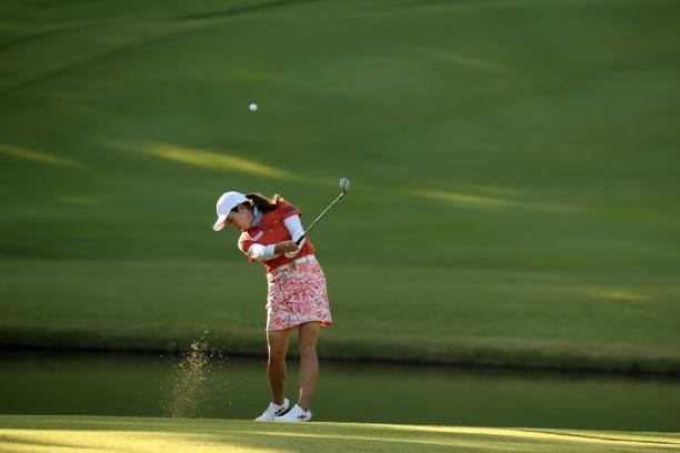 Yukari Nishiyama hits her third shot on the 8th hole during the first round of the Stanley Ladies at Tomei Country Club on October 8, 2021 in Susono,...