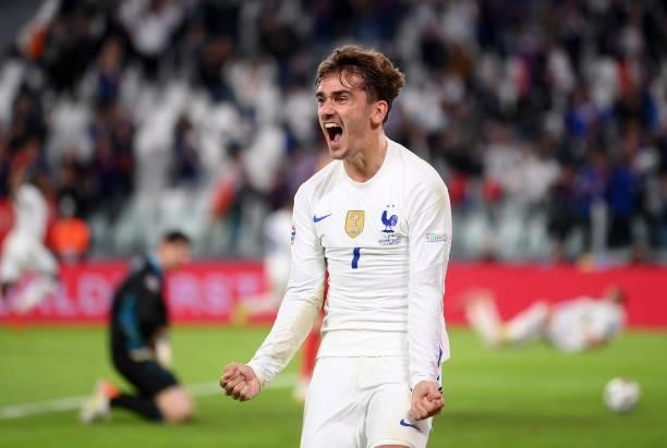 Antoine Griezmann of France celebrates their side's third goal scored by Theo Hernandez of France during the UEFA Nations League 2021 Semi-final...