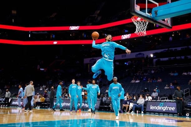 James Bouknight of the Charlotte Hornets warms up prior to their game against the Memphis Grizzlies at Spectrum Center on October 07, 2021 in...