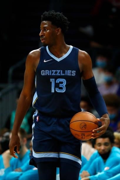 Jaren Jackson Jr. #13 of the Memphis Grizzlies looks on during the first period of their game against the Charlotte Hornets at Spectrum Center on...