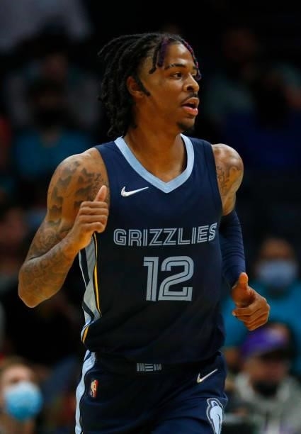 Ja Morant of the Memphis Grizzlies runs the court during the first period of their game against the Charlotte Hornets at Spectrum Center on October...
