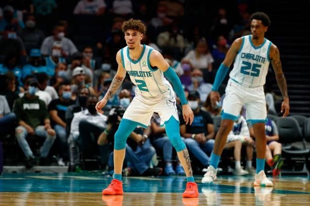 LaMelo Ball and P.J. Washington of the Charlotte Hornets look on during the first period of their game against the Memphis Grizzlies at Spectrum...