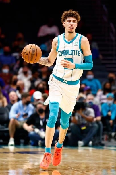 LaMelo Ball of the Charlotte Hornets brings the ball up court during the first period of their game against the Memphis Grizzlies at Spectrum Center...