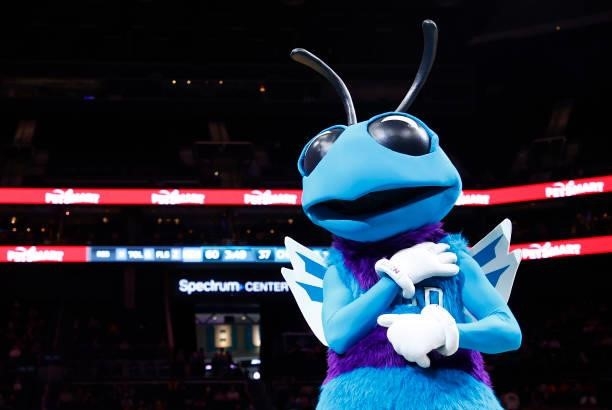 Charlotte Hornets mascot Hugo reacts during the second period of their game against the Memphis Grizzlies at Spectrum Center on October 07, 2021 in...
