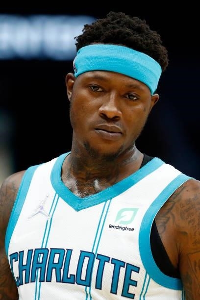 Terry Rozier of the Charlotte Hornets looks on during the second period of their game against the Memphis Grizzlies at Spectrum Center on October 07,...
