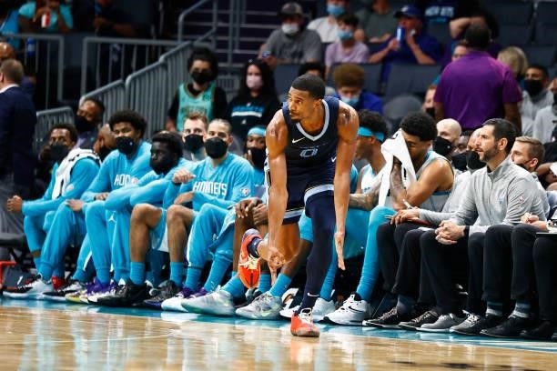 De'Anthony Melton of the Memphis Grizzlies reacts following a three point basket during the second period of their game against the Charlotte Hornets...