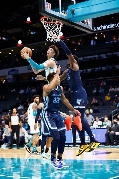 LaMelo Ball of the Charlotte Hornets attempts a basket during the second period of their game against the Memphis Grizzlies at Spectrum Center on...