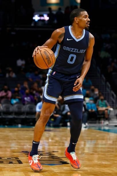 De'Anthony Melton of the Memphis Grizzlies looks over the court during the third period of their game against the Charlotte Hornets at Spectrum...