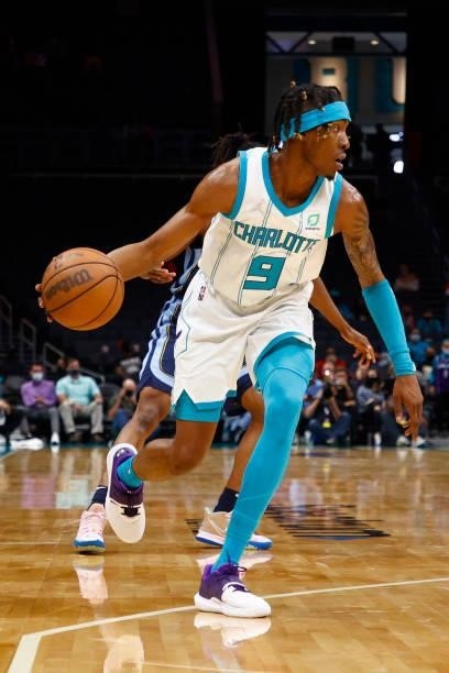 Wes Iwundu of the Charlotte Hornets dribbles during the fourth period of their game against the Memphis Grizzlies at Spectrum Center on October 07,...