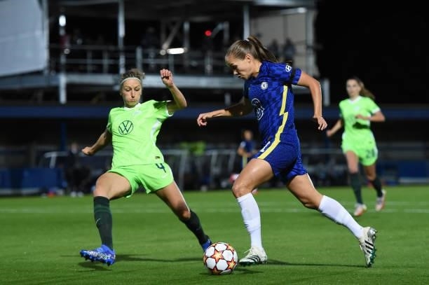Guro Reiten of Chelsea takes on Kathrin-Julia Hendrich of VfL Wolfsburg during the UEFA Women's Champions League group A match between Chelsea FC...