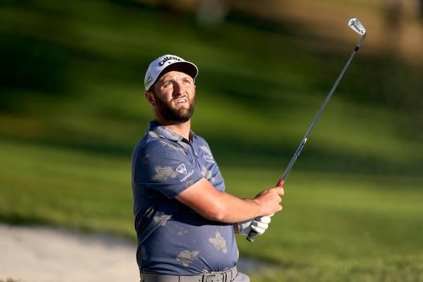 Jon Rahm of Spain watches his shot from a bunker during Day Two of The Open de Espana at Club de Campo Villa de Madrid on October 08, 2021 in Madrid,...