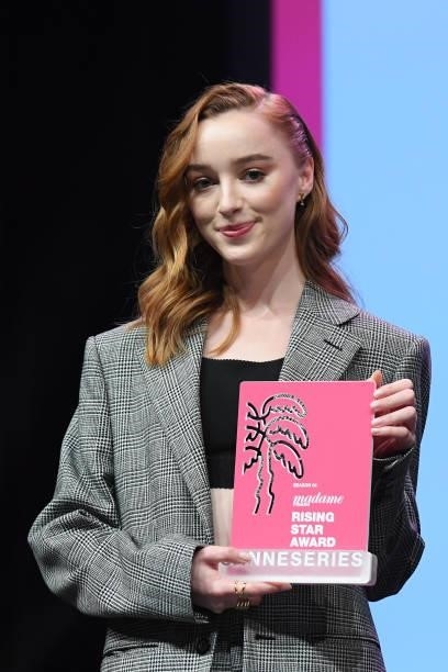 Phoebe Dynevor stands after she received the Canneseries Rising Star Award during the opening ceremony during the 4th Canneseries Festival on October...