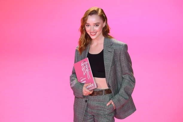 Phoebe Dynevor stands after she received the Canneseries Rising Star Award during the opening ceremony during the 4th Canneseries Festival on October...
