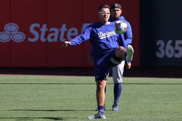 Julio Urias of the Los Angeles Dodgers warms up prior to Game 1 of the National League Division Series against the San Francisco Giants at Oracle...