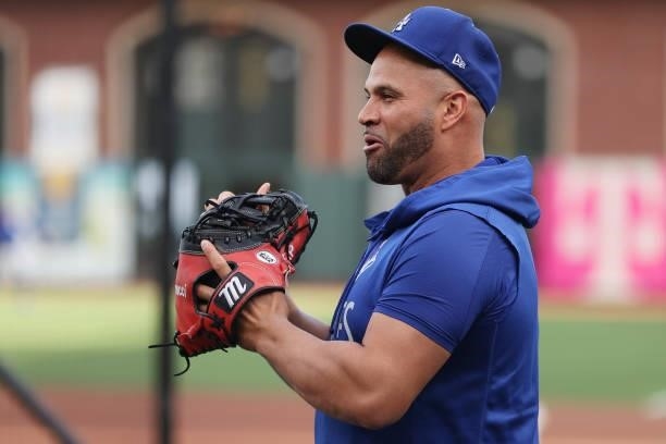 Albert Pujols of the Los Angeles Dodgers warms up prior to Game 1 of the National League Division Series against the San Francisco Giants at Oracle...