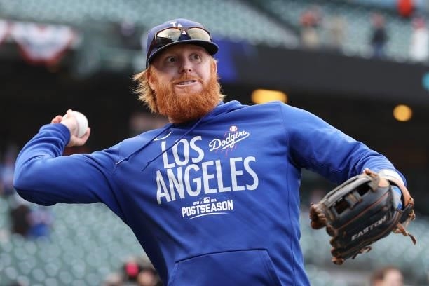 Justin Turner of the Los Angeles Dodgers warms up prior to Game 1 of the National League Division Series against the San Francisco Giants at Oracle...