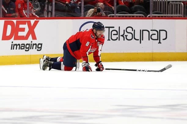 Alex Ovechkin of the Washington Capitals gets up slowly against the Philadelphia Flyers in the first period of a preseason game at Capital One Arena...
