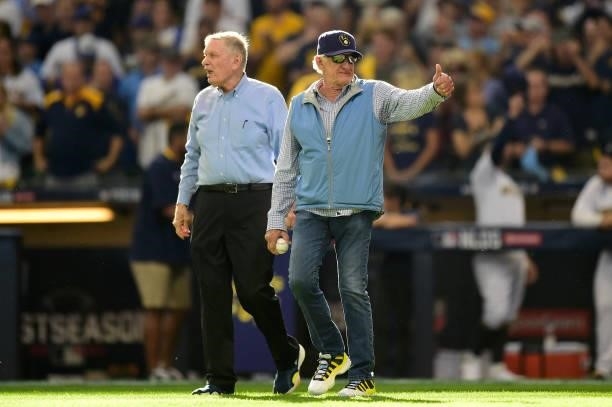 Bud Selig and Bob Uecker walk on the field for the first pitch during game 1 of the National League Division Series between the Milwaukee Brewers and...