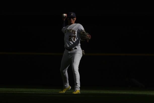 Willy Adames of the Milwaukee Brewers warms up before the game 1 of the National League Division Series against the Atlanta Braves at American Family...
