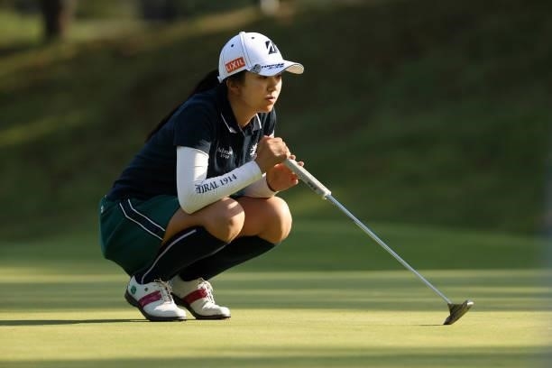 Kotone Hori of Japan lines up a putt on the 10th green during the second round of the Stanley Ladies at Tomei Country Club on October 9, 2021 in...