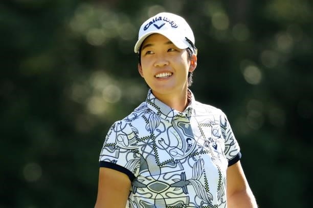 Hee-kyung Bae of South Korea smiles on the 3rd tee during the second round of the Stanley Ladies at Tomei Country Club on October 9, 2021 in Susono,...