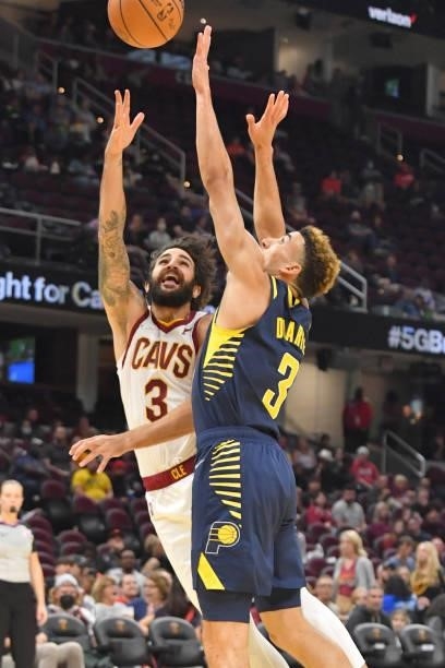 Ricky Rubio of the Cleveland Cavaliers shoots over Chris Duarte of the Indiana Pacers during the third quarter at Rocket Mortgage Fieldhouse on...