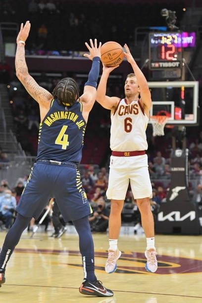 Kevin Pangos of the Cleveland Cavaliers shoots over Duane Washington Jr. #4 of the Indiana Pacers during the fourth quarter at Rocket Mortgage...