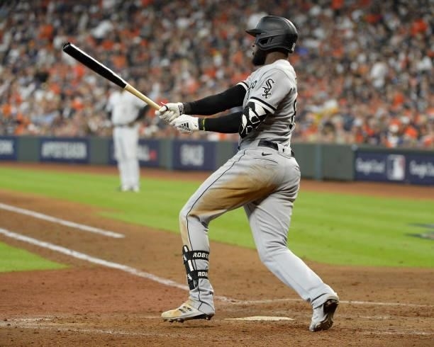 Luis Robert of the Chicago White Sox singles in the seventh inning against the Houston Astros during Game Two of the American League Division Series...