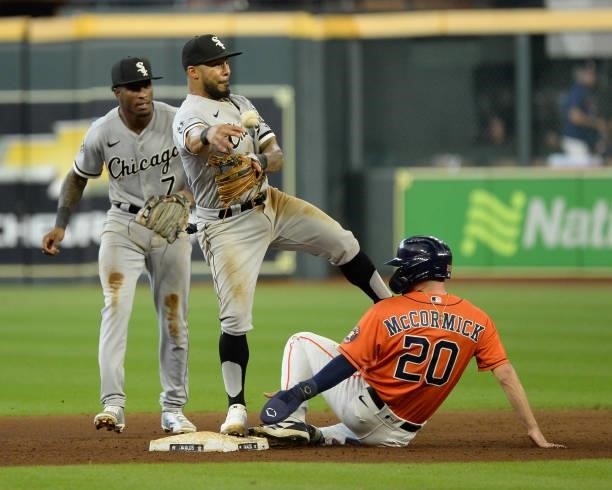 Leury Garcia of the Chicago White Sox turns a double play in the sixth inning against the Houston Astros during Game Two of the American League...