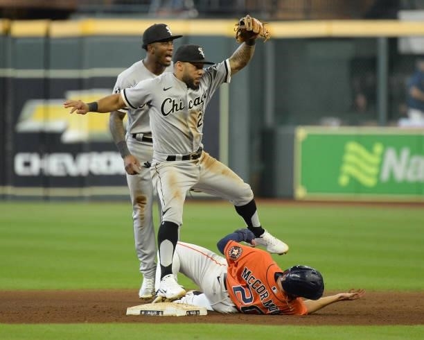 Leury Garcia of the Chicago White Sox turns a double play in the sixth inning against the Houston Astros during Game Two of the American League...