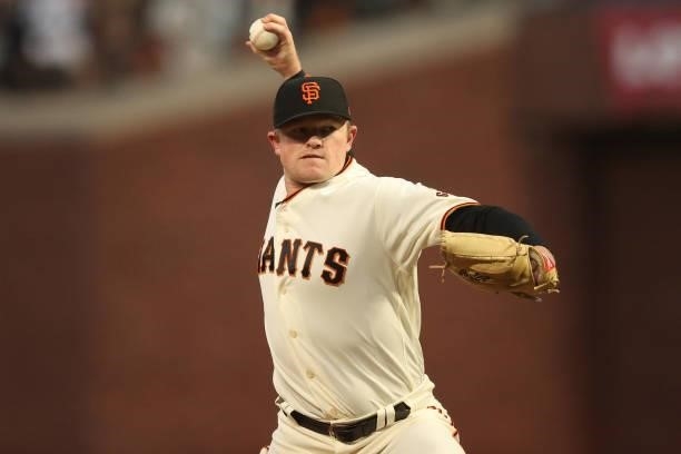 Logan Webb of the San Francisco Giants delivers a pitch in the first inning against the Los Angeles Dodgers during Game 1 of the National League...