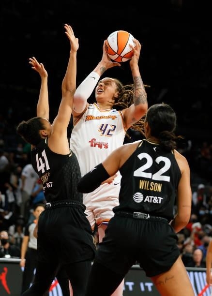 Brittney Griner of the Phoenix Mercury shoots against Kiah Stokes and A'ja Wilson of the Las Vegas Aces during Game Five of the 2021 WNBA Playoffs...