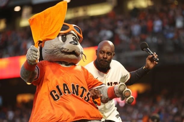 Hall of Fame receiver Jerry Rice celebrates with mascot Lou Seal prior to Game 1 of the National League Division Series between the San Francisco...